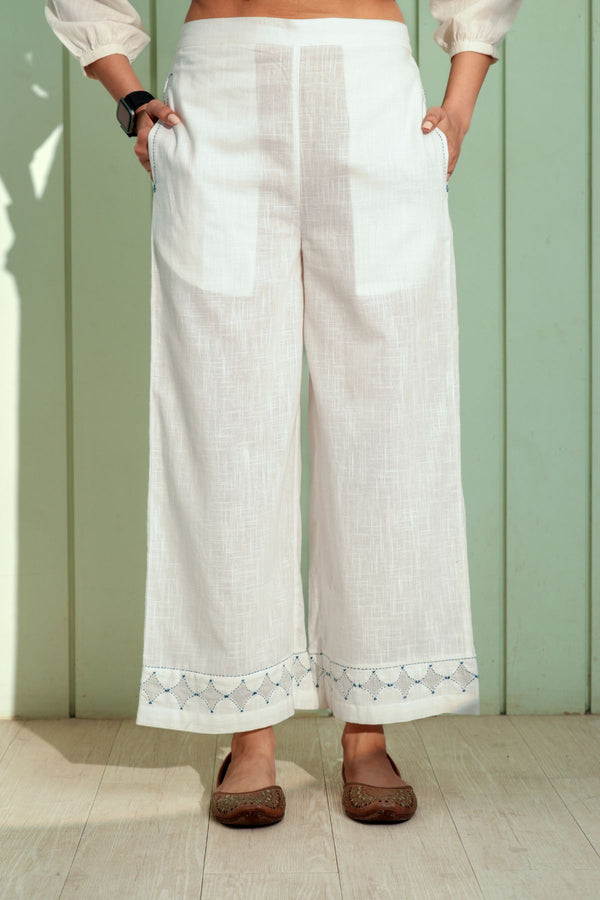 Dhwani White Flared Cotton Pant With Applique