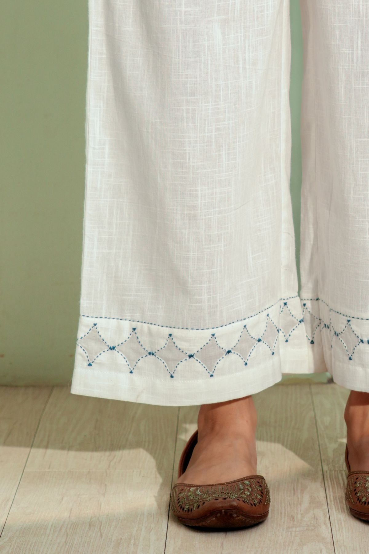 Dhwani White Flared Cotton Pant With Applique