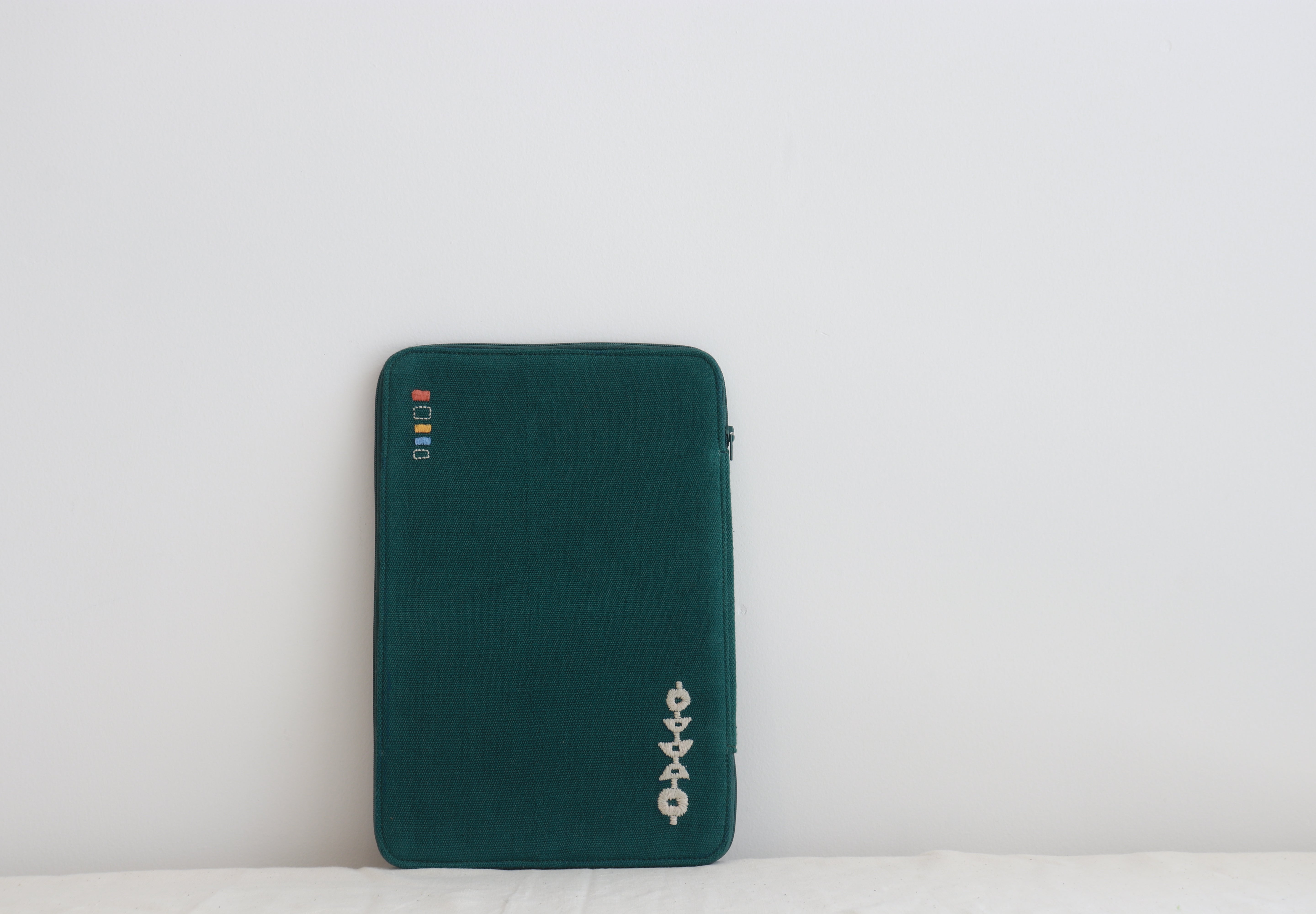 Nivara Ipad Sleeve - Blue, Brown, Dark Green.