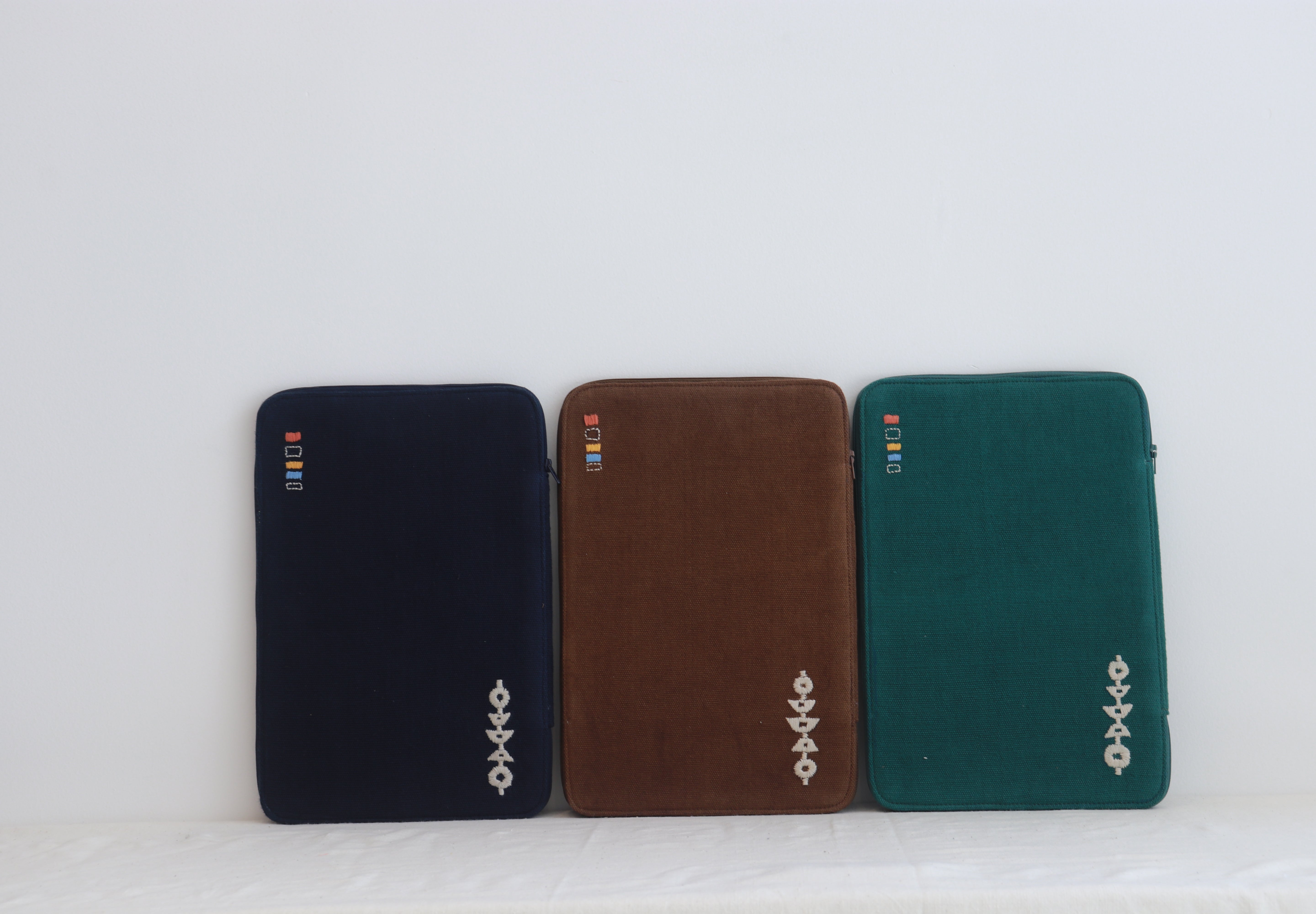 Nivara Ipad Sleeve - Blue, Brown, Dark Green.