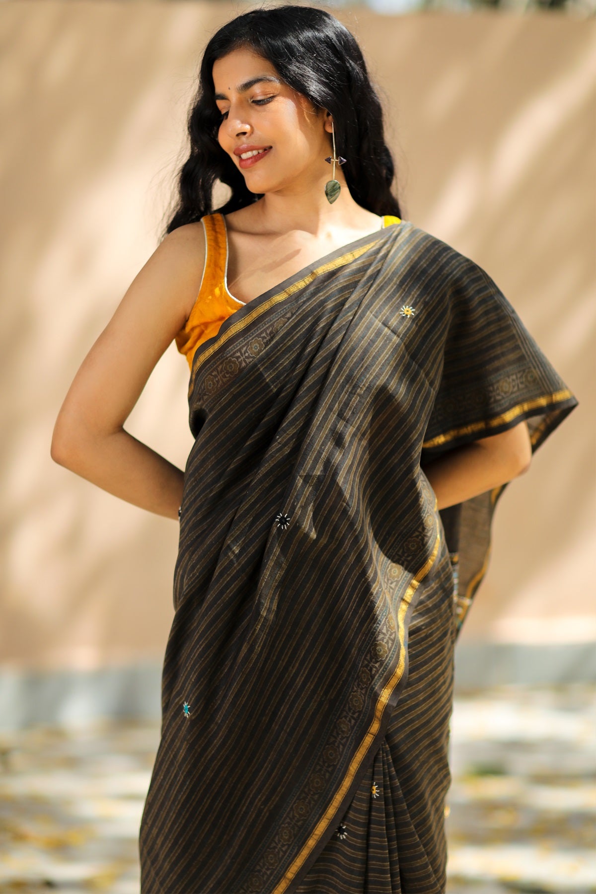 Naira Hand Printed And Contrast Thread Embroidered Brown Saree