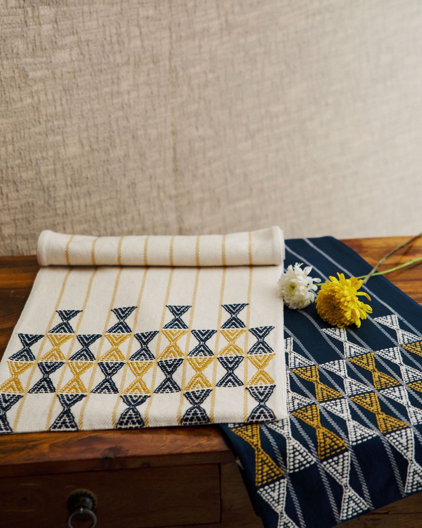 Two extra weft table runner in neutral, mustard and navy